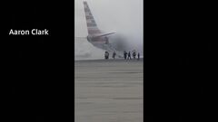 着陸したアメリカン航空機から出火　12人軽傷　米デンバー国際空港| TBS CROSS DIG with Bloomberg