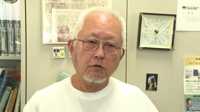 足早に立ち去る農業法人の関係者