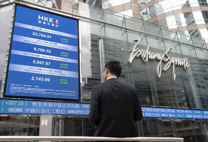 香港取引所、株式取引時間の延長や昼休み廃止を検討－関係者