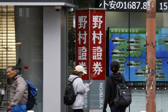 野村証、日本株の一部銘柄でネット経由の買い注文停止－不正対策