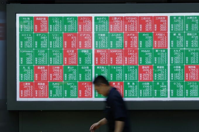 【日本市況】日経平均反落、半導体関連に売り－円上昇、債券もみ合い