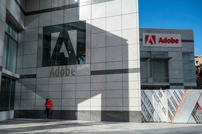 アドビの売上高見通し、市場予想下回る－ＡＩ競争激化の懸念強まる