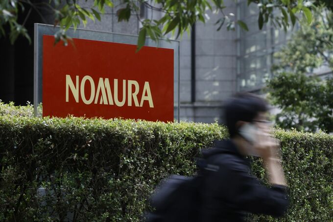 野村証、顧客の自宅訪問で事前承認制を導入－元社員の逮捕受けて