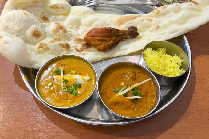 日本のトリレンマ、インド料理店危機が示す－安さ維持には最低限の移民受け入れ必要