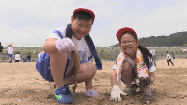 海開きを前に、児童や高校生が海岸清掃と大津波警報が発表された想定で避難訓練 岩手・陸前高田市|TBS NEWS DIG