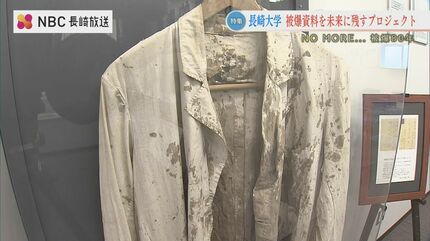 全部僕の血」血染めの白衣、突き刺さったガラス フランス製人体模型