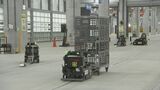 郵便DX「無人搬送車」を初導入 最新巨大施設をメディアに公開 日本郵便|TBS NEWS DIG