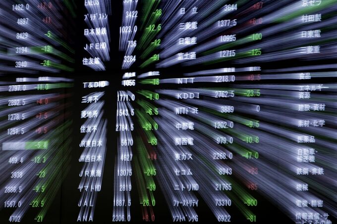 日経平均は一時1000円超安、米ハイテク売り嫌気－為替急変動に警戒も