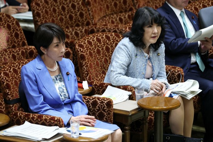     Sanae Takaichi, Japan’s prime minister, left, and finance minister Satsuki Katayama.     