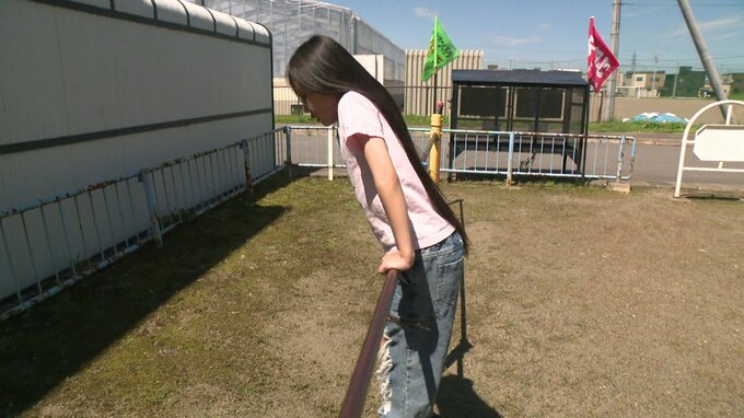 長い髪を二つ結びにしている橋本陣さん