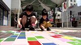 街をキャンバスに!中心街を11色のペンキで彩る|TBS NEWS DIG