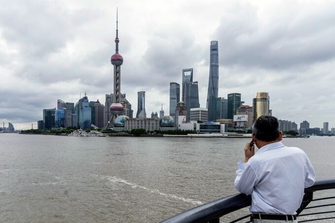 JPモルガン、中国株の投資判断引き上げ－AI採用や刺激策が追い風に