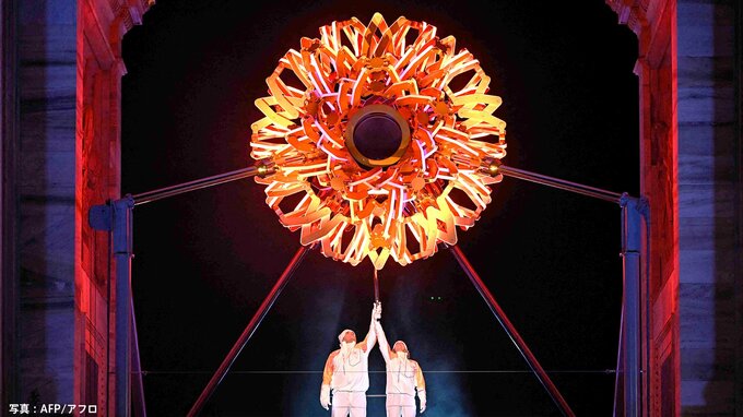 史上初、2か所の聖火が同時に点灯　ミラノではアルペンで金3個のスター・トンバ氏＆コンパニョーニ氏が点火者【開会式】|TBS NEWS DIG