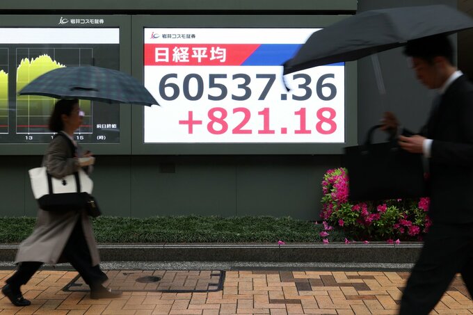 【日本市況】日経平均終値初の6万円、イラン提案と業績期待－債券安
