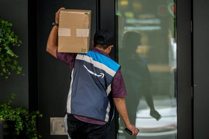 関税の影響は大手ハイテク企業にも、アマゾンやアップルの決算が示唆