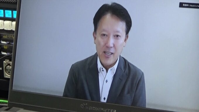 インタビューに応じる根本昌宏教授