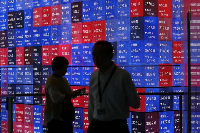 半導体株安加速、ナスダック100指数は調整局面目前－AI投資に懐疑論