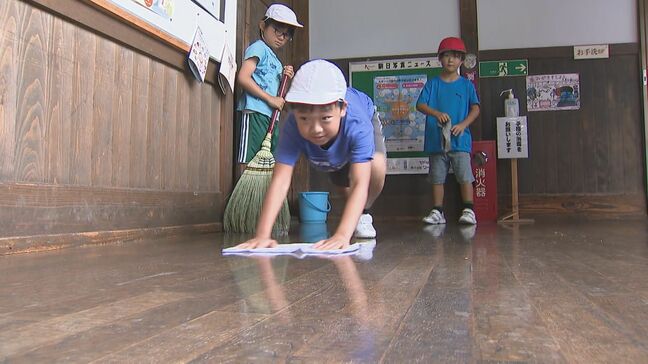 小学校を襲った5棟焼失の大火災…あれから13年の今年も「校舎を大切にする日」として地域を挙げて清掃活動|TBS NEWS DIG