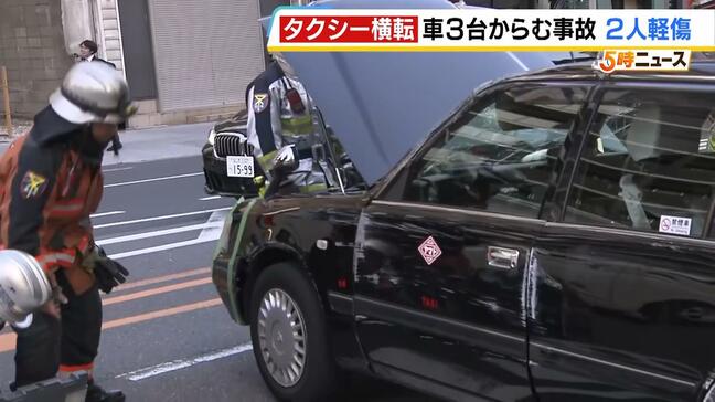 大阪・天王寺区の国道でタクシー横転 運転手と乗客とみられる男性2人が軽傷 JR寺田町駅から北に約200mの地点|TBS NEWS DIG