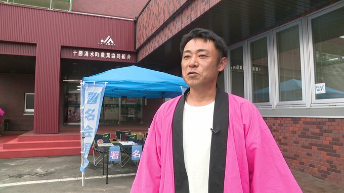 取材に答える住民グループ代表 宮川司さん