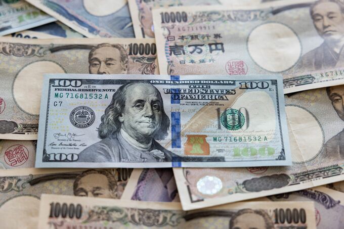 円は対ドルで148円台前半、米中貿易合意を受け約１カ月ぶり安値圏