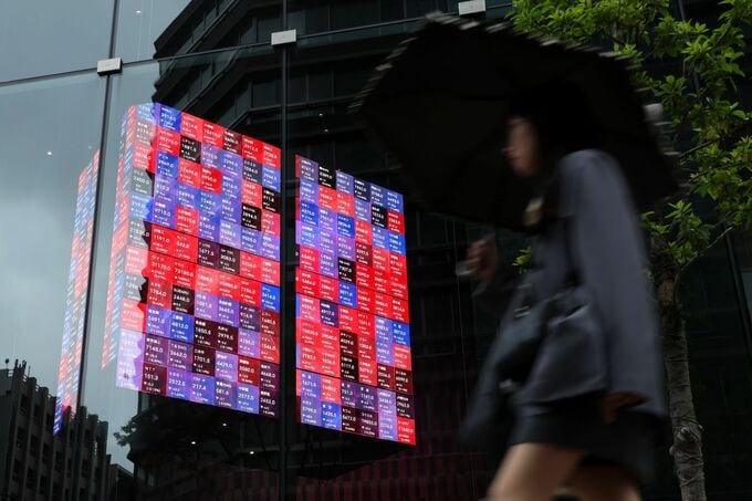 金利急騰下の銀行株、運用収益で明暗－債券含み損警戒で選別加速も