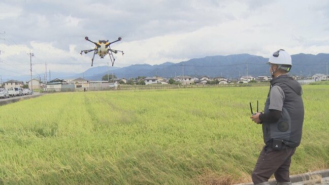 労働時間やコスト削減につながる乾いた田んぼに種をまく稲作　「未来の田んぼ」農家や高校生が見学　ドローンで除草剤をまくスマート農業との併用を紹介　山梨|TBS NEWS DIG