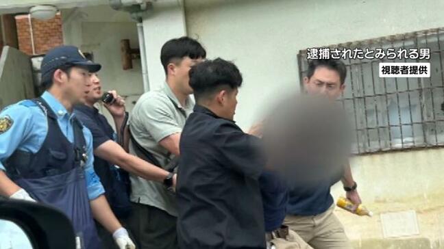 天皇ご一家沖縄訪問の警備中 年齢不詳の男を公務執行妨害の疑いで逮捕 沖縄訪問に抗議か|TBS NEWS DIG