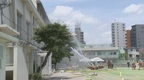 【速報】東京・北区の小学校で火災　昼ごろほぼ消し止め　全員避難完了　児童と教員ら10人けが　4階音楽室でストーブ点検中に出火か|TBS NEWS DIG