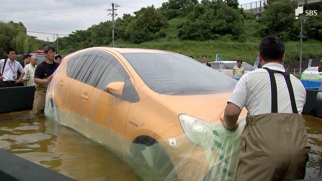 大雨でも車の水没防げ　車をすっぽり包んで水に浮く…特殊なシート、静岡市の企業が開発|TBS NEWS DIG