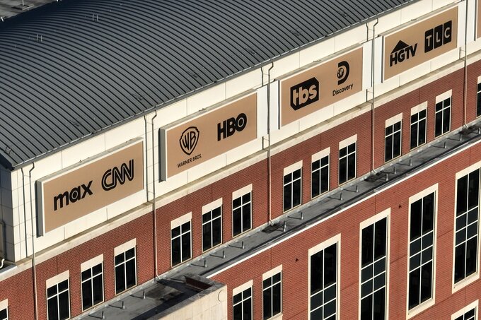 ワーナー争奪戦、不振のケーブル資産評価が焦点に－勝敗の行方左右も