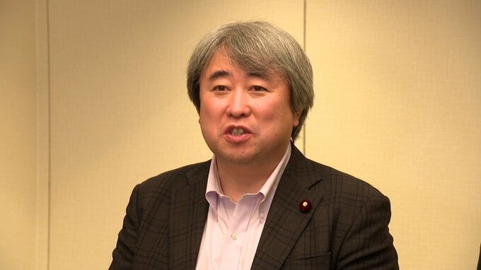 インタビューに答える神谷裕代表