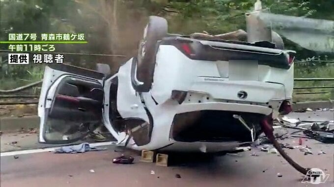 【速報】国道7号　乗用車が横転…　トラックと乗用車が絡む事故発生　男性1人が意識不明の状態で市内の病院に搬送　警察が事故の原因調べる　青森市鶴ヶ坂|TBS NEWS DIG
