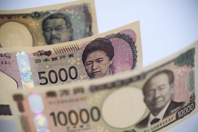 円は144円台前半、ドルの調整売りが下支え－一時下げ拡大場面も