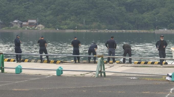 港の岸壁先の海中に水没した車両から、頭部が白骨化した遺体が見つかる…胴体は運転席で見つかり死蝋化　遺体の身元が判明、死因は不詳|TBS NEWS DIG