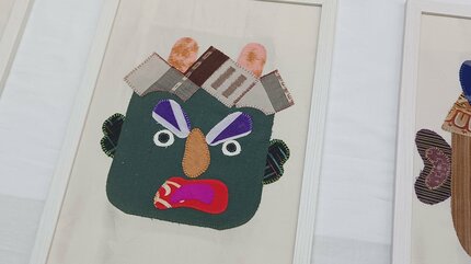 あなたの顔に似た鬼を探してみて」手縫いで作った鬼の顔の布絵を集めた